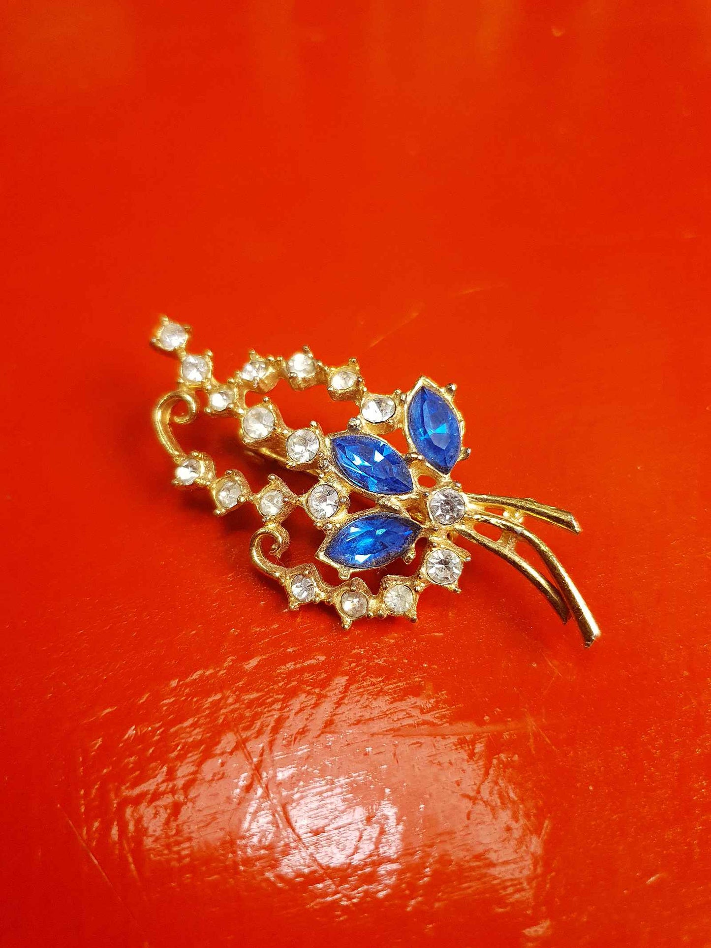 Vintage 1940s Blue Rhinestone Floral Brooch Flower Sprig Gold Tone