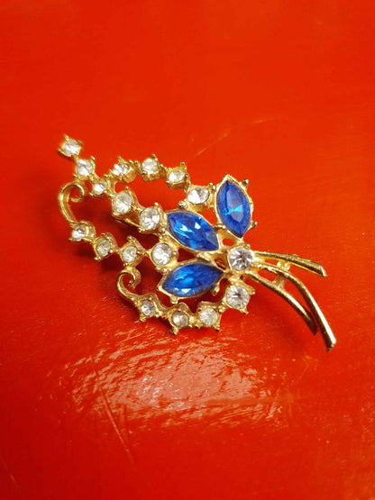 Vintage 1940s Blue Rhinestone Floral Brooch Flower Sprig Gold Tone
