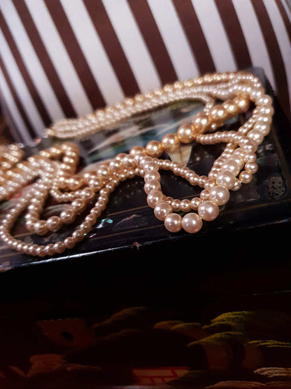 Vintage 1970s Faux Pearl Necklace 24" Peach Four Strand Pearls